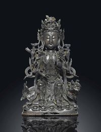 17TH CENTURY A BRONZE MODEL OF AVALOKITESVARA