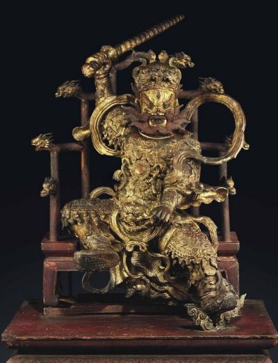 LATE MING DYNASTY，16TH/17TH CENTURY A RARE LARGE GILT-BRONZE FIGURE OF THE DAOIST GUARDIAN FIGURE WA