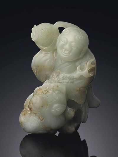 MING DYNASTY，17TH CENTURY A PALE CELADON JADE CARVING OF A BOY AND A BUDDHIST LION