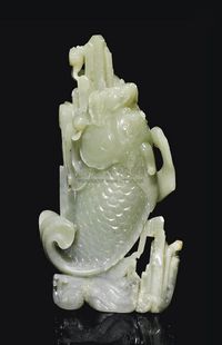 19TH CENTURY A CELADON JADE‘DRAGON-CARP’VASE