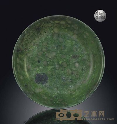 A LARGE SPINACH-GREEN JADE DISH 