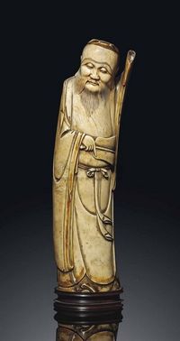 LATE MING DYNASTY，17TH CENTURY A LARGE IVORY CARVING OF AN IMMORTAL