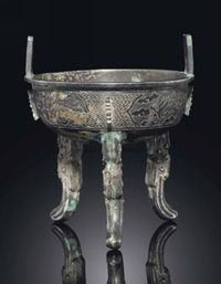 MING DYNASTY，17TH CENTURY A SMALL WHITE METAL TRIPOD CENSER