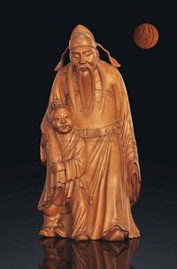 SIGNED JING FU，REPUBLIC PERIOD （1912-1949） A CARVED BOXWOOD MODEL OF A DAOIST IMMORTAL