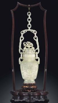 19TH CENTURY A WHITE JADE HANGING VASE AND COVER