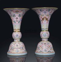 A PAIR OF FAMILLE ROSE PINK-GROUND CANDLESTICKS