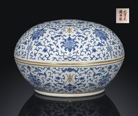 A RARE BLUE-ENAMEL DECORATED CIRCULAR BOX AND COVER