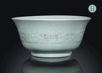 A RARE MOULDED CELADON-GLAZED BOWL