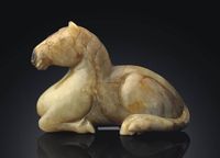 17TH CENTURY A MOTTLED JADE MODEL OF A HORSE