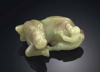 18TH CENTURY A SMALL YELLOW JADE CARVING OF A HORSE