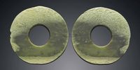 NEOLITHIC PERIOD，CIRCA 6500-1700 BC A RARE MATCHING PAIR OF JADE DISCS，HUAN