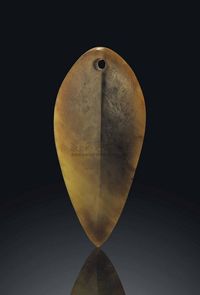 SHANG DYNASTY，CIRCA 1600-1100 BC A MOTTLED CELADON JADE SPEARHEAD