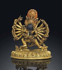 18TH CENTURY A GILT-BRONZE FIGURE OF YAMANTAKA