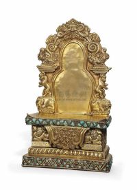 TIBET/MONGOLIA 18TH CENTURY A TURQUOISE AND CORAL INLAID GILT COPPER SHRINE