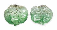 AN OVAL JADEITE PENDANT