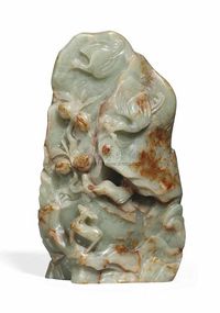 18TH CENTURY A CELADON AND RUSSET JADE MOUNTAIN