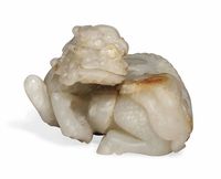 17TH/18TH CENTURY A PALE CELADON JADE CARVING OF A QILIN