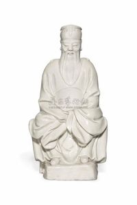 17TH CENTURY A DEHUA MODEL OF A SEATED OFFICIAL