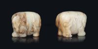 MING DYNASTY (1368-1644) A CELADON AND RUSSET JADE ELEPHANT