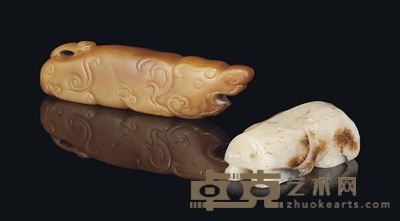 17TH CENTURY OR LATER A CELADON AND RUSSET JADE BOAR AND A BROWN JADE ANIMAL-FORM HANDLE 长9.8cm