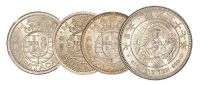 明治三十七年日本“龙银”壹圆银币一枚；1952年澳门银币伍圆二枚、1971年一枚