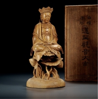 清·檀香木雕男相观音坐像