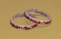 18TH-19TH CENTURY A PAIR OF RED-OVERLAY‘SNOWFLAKE’ GLASS BANGLES