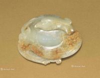 18TH CENTURY A PALE CELADON AND RUSSET JADE‘PHOENIX’ INK STONE