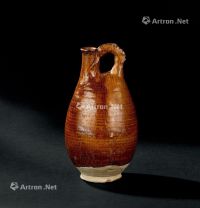 辽代（907-1125年） 黄釉鸡冠皮囊壶