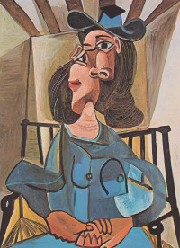 毕加索  坐在扶手椅上戴帽子的女人