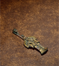西汉·龙首饕餮纹鎏金带钩