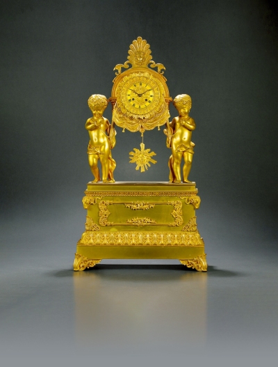 十九世纪制 太阳神饰双天使鎏金座钟