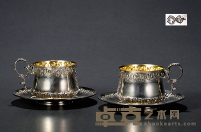 十九世纪制 洛可可风格纯银鎏金咖啡杯一对 茶杯口径：8.5cm 高：9cm
茶碟直径：16cm 总重量：约574g