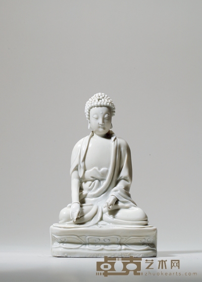 明·白釉释迦摩尼座像 高:23.5cm