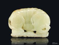 A WHITE JADE CARVING OF AN ELEPHANT